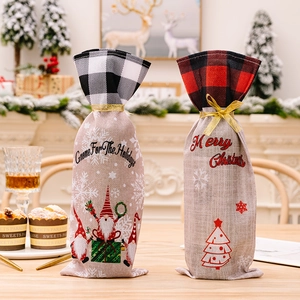 Christmas gnome wine bottle gift bags with plaid patterns and festive holiday decorations