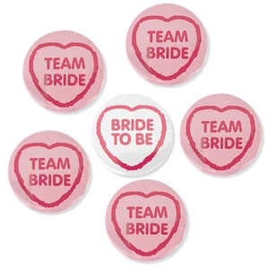 6-piece wedding badge set with Bride To Be and Team Bride heart designs in pink and white