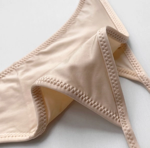 Close-up of zigzag stitching on high-elastic ice silk fabric for seamless underwear