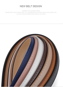 Detailed view of colorful slim fashion belts with elegant stitching and metal buckles
