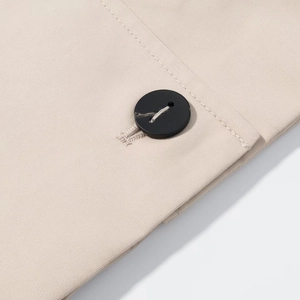 Short beige trench coat for women with classic lapel and premium twill fabric detail