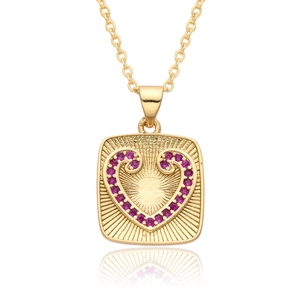 Detail of square gold pendant with purple zircon heart and radial engraved sunburst design
