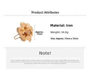 Detail view of irregular wrinkled gold flower cuff showing iron material and dimensions