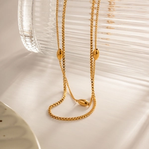Collier double rang en acier inoxydable plaqué or 18k avec perles ovales polies