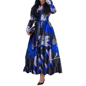 Detail of blue floral print on silky long sleeve dress with button-down collar design