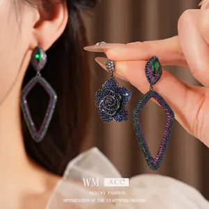 Vintage zircon flower earrings with asymmetrical colorful gemstones and dark metal plating