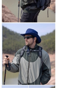 Detail of wide brim sun hat with adjustable strap and outdoor hiking gear in the mountains