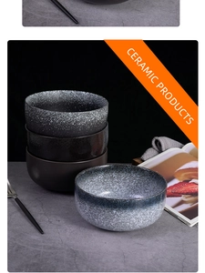 Macro detail of stacking vintage ceramic bowls with matte glazed snowflake texture