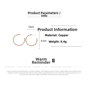 Detail view of rose gold C-shaped earrings with dimensions 3.8cm by 4.2cm shown on white background