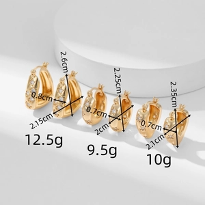 Detailed comparison of three sizes of gold star hoop earrings with zirconia stones
