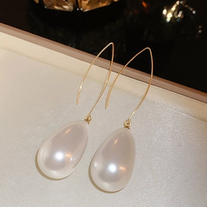 Elegant gold hook teardrop pearl earrings with a soft lustrous finish for women
