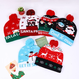 Festive knitted Christmas hats with LED lights, colorful patterns and pom-pom tops