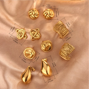 Detail showing five pairs of 18K gold plated teardrop and textured button stud earrings
