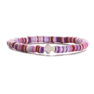 Detail of 6mm colorful polymer clay heishi bead bracelet with a white cross charm centerpiece