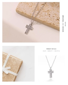 Detail showing a silver cross pendant with micro-paved zircons and a fine O-chain necklace