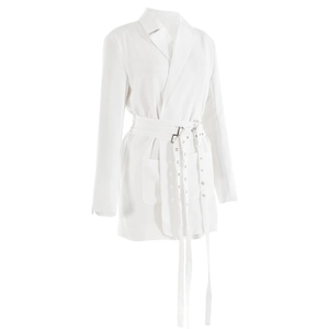 Detail of white blazer dress featuring a stylish waist belt with metal eyelets and buckle