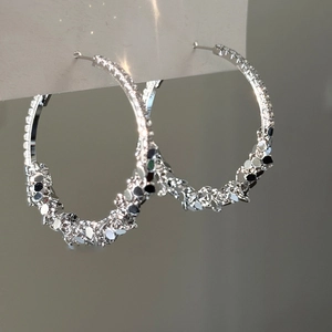 Chic silver round hoop earrings with sparkling textured finish for a luxury fashion look