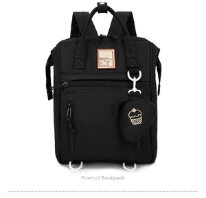 Front view of black waterproof nylon diaper backpack with Nutrition Facts patch and cupcake pouch