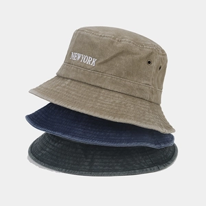 Vintage washed cotton bucket hat with New York embroidery and metal eyelets in three colors