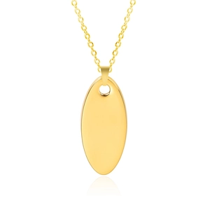 Detailed macro view of an oval gold-plated pendant with a smooth polished finish on a chain
