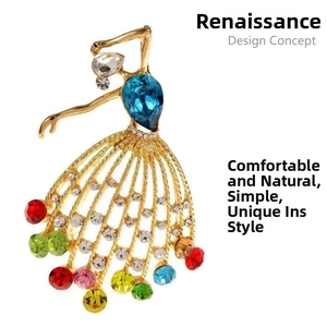 Close-up of ballet dancer brooch with colorful rhinestones and gold plating detail