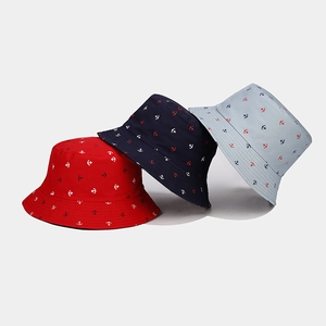 Reversible anchor print bucket hats in red, navy, and light blue for sun protection