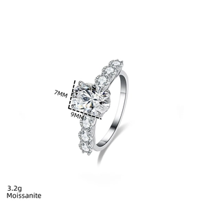 Detail view of 2ct oval moissanite ring with 9x7mm size specifications and 3.2g weight info