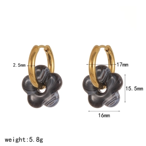 Detailed view of flower earrings with dimensions and weight specs on white backdrop