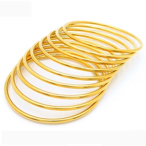 Set of 10 stacked 18k gold plated stainless steel thin bangles with 3mm wire diameter