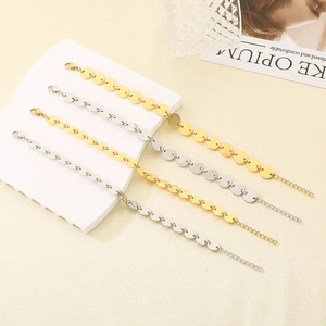 Minimalist stainless steel disk bracelets in gold and silver finish with lobster clasp