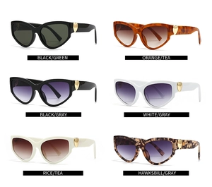 Selection of butterfly cat-eye sunglasses with golden heart detail in various frame colors