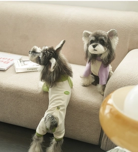 Detail view of contrast stitching and ribbed cuffs on velvet dog thermal pajamas