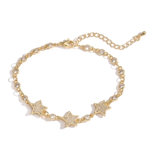 Minimalist gold Cuban chain bracelet featuring star charms and cubic zirconia stones