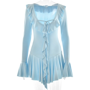 Detail of light blue dress with ruffled hem and drawstring neckline tie design