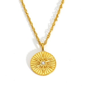 18K gold plated stainless steel sunburst coin necklace with a central zircon stone