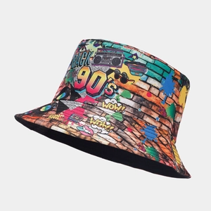Detail of retro 90's graffiti print bucket hat showing vibrant street art pattern and fabric