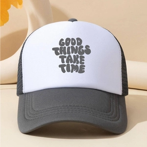 Modern two-tone mesh trucker hat featuring Good Things Take Time text on front