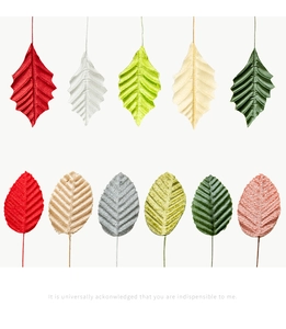 Detailed grid of artificial silk leaves in various colors for wedding DIY decor