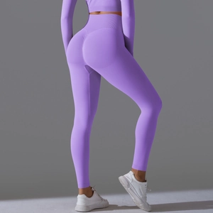 Close-up of seamless purple yoga leggings featuring high waist and scrunch butt design