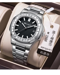 Detail of silver stainless steel watch with diamond-set bezel and black embossed dial