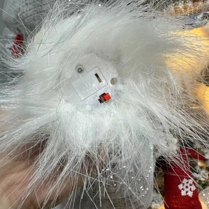 Illuminated Christmas gnome plush with integrated battery box and red power switch