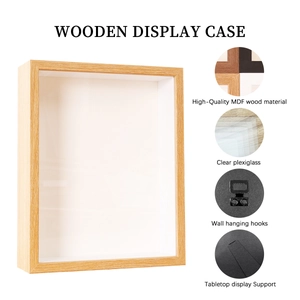 Detail of wooden shadow box showing MDF frame, clear plexiglass, and hanging hooks