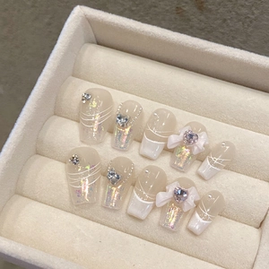 Handmade aurora press-on nails set with 3D bows and heart zircons in a velvet box