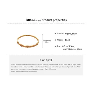 Detailed dimensions of gold plated heart bracelet with cubic zirconia on a white background