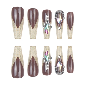Dark brown long coffin press-on nails with gold glitter and 3D luxury rhinestones