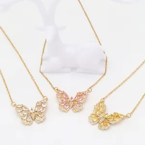 Three elegant butterfly pendant necklaces with pink, yellow, and white zircon crystals