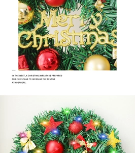 Détail d'une couronne de Noël avec inscription dorée et lumières LED intégrées