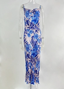 Detail of pleated floral print maxi dress in light pink and blue with slim fit design