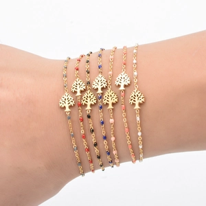 Set of 7 gold-plated tree of life beaded bracelets with colorful oil-drip seed beads