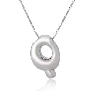 Macro shot of silver letter Q pendant with smooth finish on a delicate square box chain